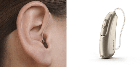 Niewidoczne zauszne aparaty słuchowe typu RIC ze słuchawką w uchu oraz łącznością bezprzewodową bluetooth.